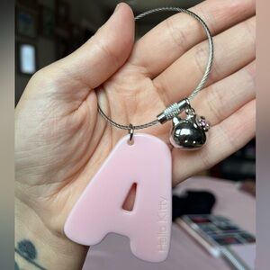 Brand New. Sanrio Hello Kitty letter A Keychain.